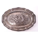 A pewter plate of lobed oval form,