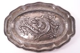 A pewter plate of lobed oval form,