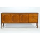 A teak sideboard with plain rectangular top over three plain fronted drawers and three doors,