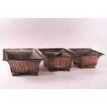 A set of three plated planters of graduated lozenge form with ribbed bodies