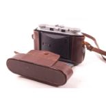 A Voiglander Bessa 11 camera in a leather case, the lens synchro- compur, color-skopar