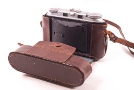 A Voiglander Bessa 11 camera in a leather case, the lens synchro- compur, color-skopar
