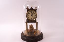 A Gustav Becker torsion clock under glass dome and metal framed base,