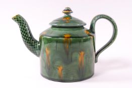 A Studio pottery teapot by Kevin de Choisey, with green and yellow glaze, seal mark,