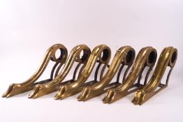 A set of five 19th century brass curtain brackets, each with an adjustable screw,