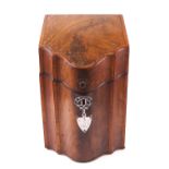 A George III mahogany and satin wood veneered shaped knife box of traditional form