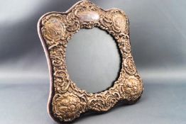 A photograph frame of square form,