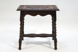 An Edwardian oak rectangular side table,