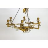 A 19th century Continental gilt metal hanging chandelier with six candle sconces,