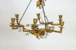 A 19th century Continental gilt metal hanging chandelier with six candle sconces,