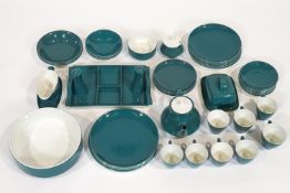 A Poole pottery part dinner service, with some runs of eight, in the Blue Moon pattern,