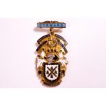 An unusual boys Masonic medal, by Garrard & Co, gilt and enamel,