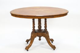 A Victorian walnut loo table,