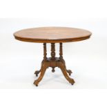 A Victorian walnut loo table,