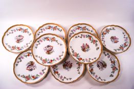 A set of nine Rosenthal porcelain plates, each printed with birds in branches,