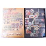 An old World Collection stamp album together with a folder of stamps ....