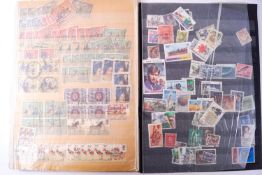 An old World Collection stamp album together with a folder of stamps ....