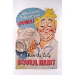 A cardboard Bovril advertising sign,