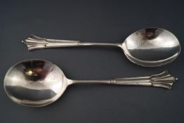 A pair of matched silver serving spoons, Francis Howard 1922,