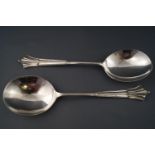 A pair of matched silver serving spoons, Francis Howard 1922,