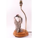 A Capodimonte Woodpecker '1983', on a lamp stand, signed and stamped (C) 1983 Florence,
