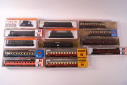 A collection of boxed Arnold, Roco and Ibertren N gauge rolling stock and locomotives,