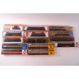 A collection of boxed Arnold, Roco and Ibertren N gauge rolling stock and locomotives,