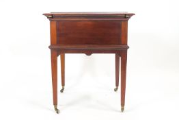 An Asprey mahogany 'Elevette' rising drinks table,