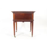 An Asprey mahogany 'Elevette' rising drinks table,