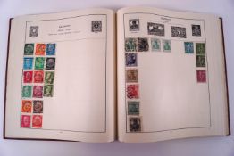Six stamp albums containing a Worldwide collection (three quite full)