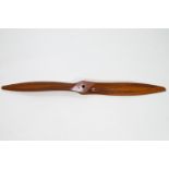 A mahogany propeller, stamped NP 06 88 16 12 210 62 32 100,