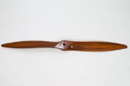 A mahogany propeller, stamped NP 06 88 16 12 210 62 32 100,