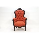 A Victorian carved mahogany lady's armchair,