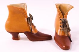 A pair of china early 20th century style heeled button boots, in buff and brown,