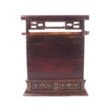 An Eastern tiffin box in hardwood,