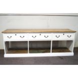 A large Victorian pine and painted dresser with three frieze drawers raised on plinth base,