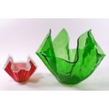 A clear green glass handkerchief bowl, 21cm high and another decorated in red,