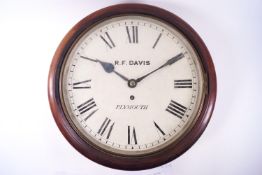 A mahogany cased wall clock by R F Davis of Plymouth, of circular form,