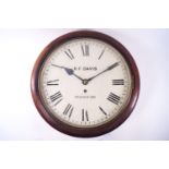 A mahogany cased wall clock by R F Davis of Plymouth, of circular form,