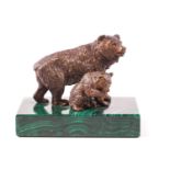 A bronze of a bear and cub on a malachite base,