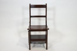 A mahogany metamorphic chair converting into library steps