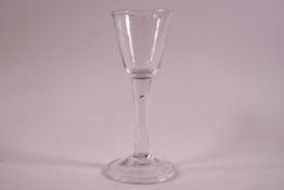 An 18th century style drinking glass with folded foot,