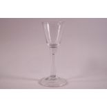 An 18th century style drinking glass with folded foot,