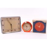 A clear Lucite cased 'Anvil Precision' Anvil clock,