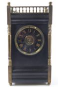 A large slate and brass cased clock, of rectangular form,