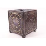 A cast metal plant holder, of square form, cast decorated with laurel leaves and eagles,