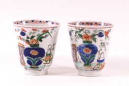 A pair of Chinese export porcelain Kangxi period wine cups(1654-1722) with later Dutch decoration