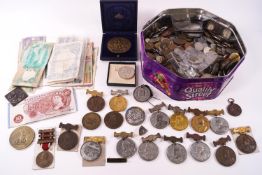 A large quantity of UK and World coins and notes