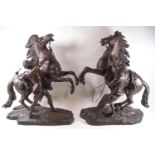 A pair of The Bronze Horses of Marly,