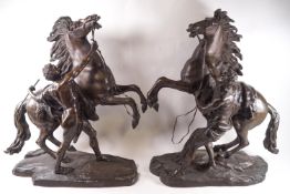 A pair of The Bronze Horses of Marly,